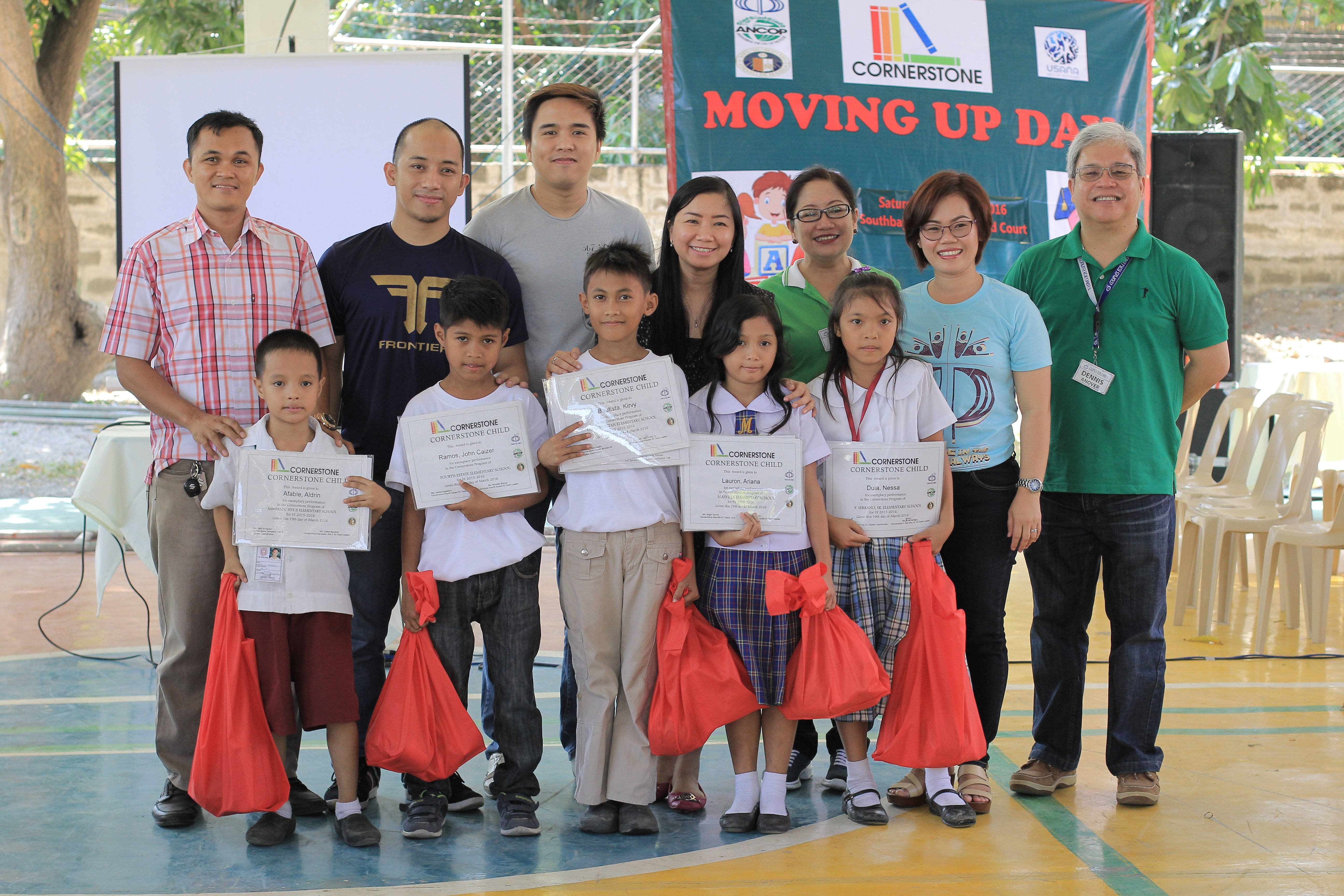Cornerstone Foundation and USANA Philippines True Health Foundation members with Cornerstone scholars during Moving Up Day